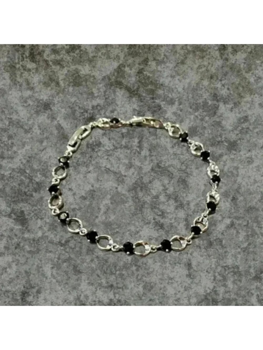 BEAUTIFUL BLACK AND SILVER CLASP BRACELET